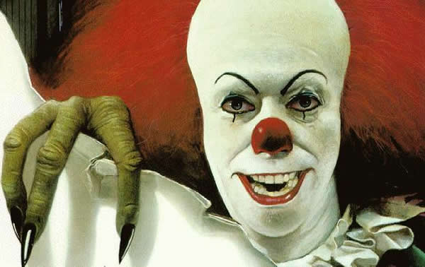 1238445669_steven_kings_it_pennywise_tim_curry_01.jpg