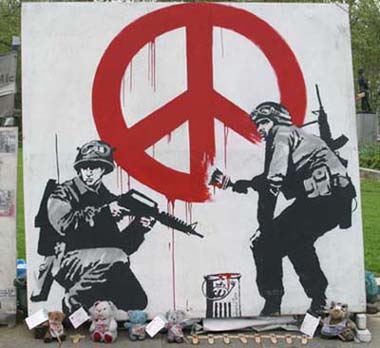 banksy-soldiers-painting-peace-sign.jpg