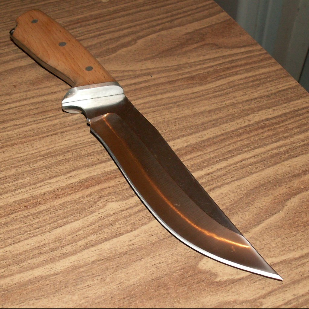 Охотничий нож с накладной рукоятью
