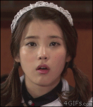 Cute-Asian-maid-wink-smile.gif