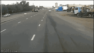 Dump-truck-collision-close-call.gif
